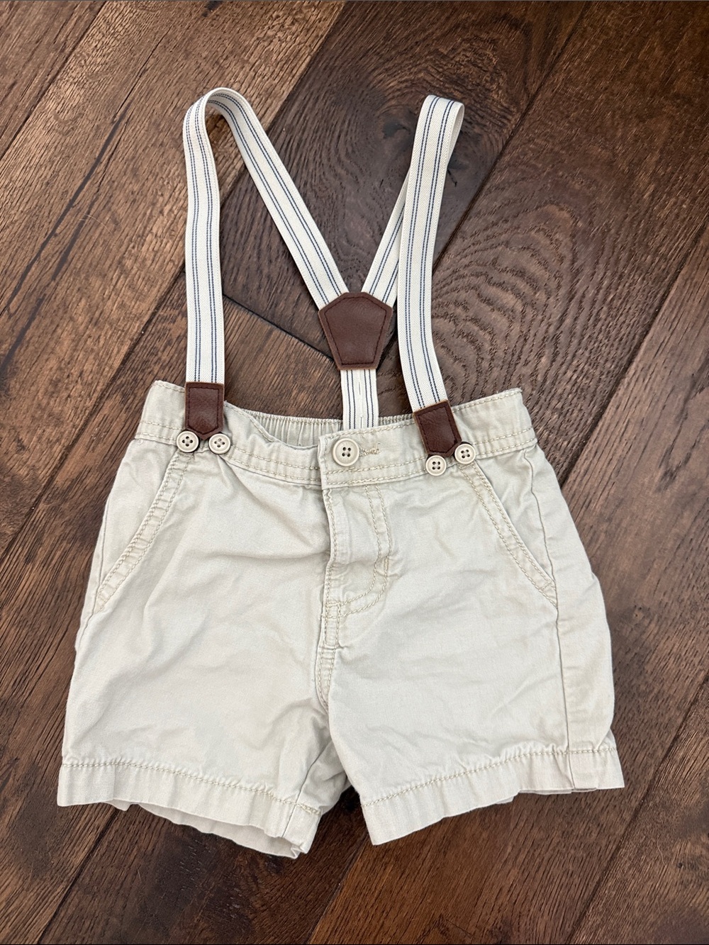 Toddler Cream/light tan Shorts with Striped Suspenders.